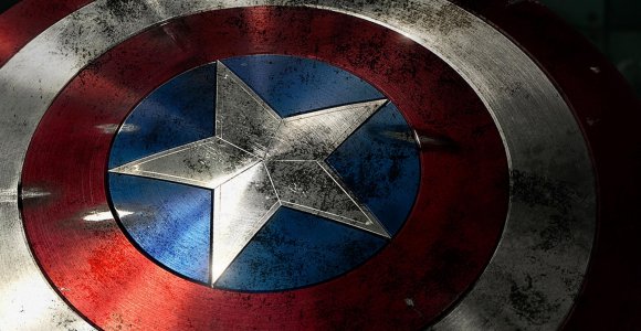 Who gives Captain America his signature, round shield in <em>Captain America: The First Avenger</em>?